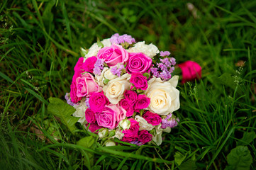 Beautiful bridal bouquet tied with silk ribbons. Wedding Accessories