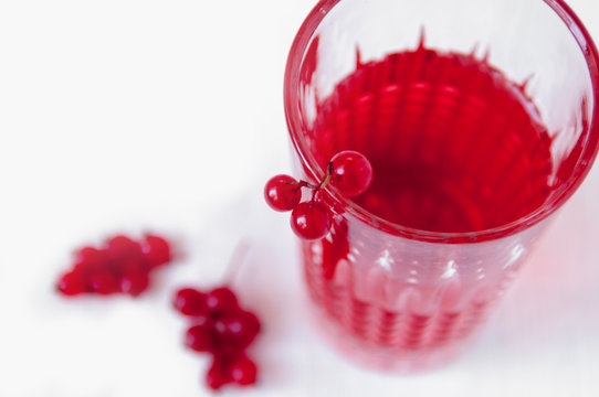 Drink red currant in a beautiful transparent glass