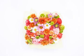 Bouquet of flowers on white background. Top view, flat lay