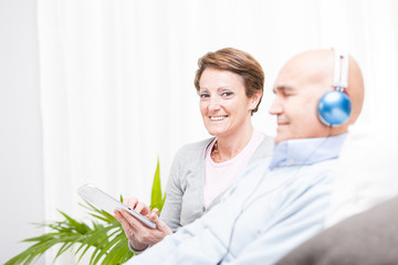 Relaxed contented middle-aged couple