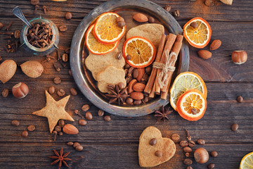 Homemade gingerbread cookies, spices and decorations