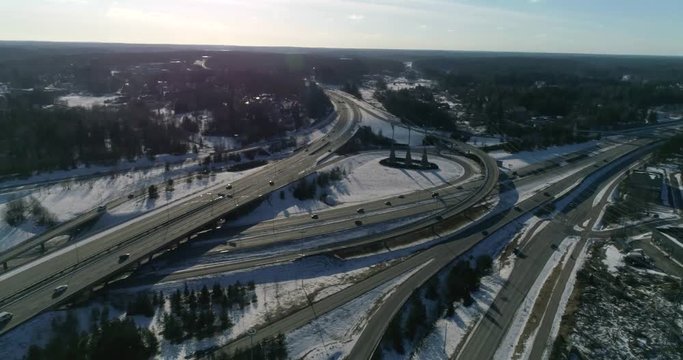 Highway E18, Cinema 4k aerial view on route e18 crossing keha 3, just outside Espoo, in Uusimaa, Finland