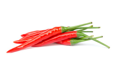  stack red chili or chilli cayenne pepper isolated on white background