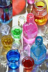 Colourful bottles and glasses