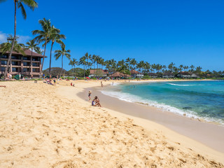 View of famous Poipu beach on Kauai island in Hawaii. 