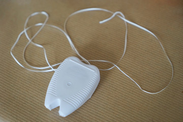 Dental floss is a tooth cleaning device.