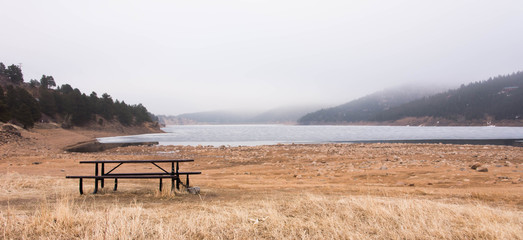 Fototapeta na wymiar Lake Scene with Picnic Table