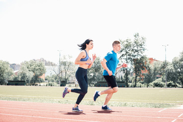 Fototapeta premium Running couple outdoors.