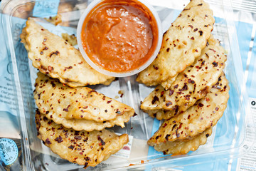 Beef empanadas with chilli sauce