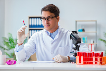 Doctor working with blood samples