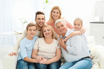 Happy family gathered in living room