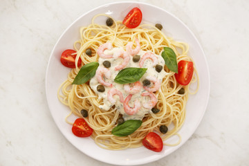 spaghetti with shrimps and tomato