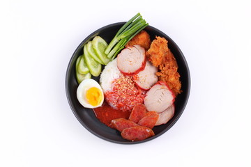 Jasmine rice with meat and boiled egg topped red sweet sauce .