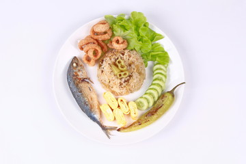 Fried jasmine rice in  green chili dip .