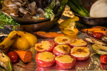 Roasting tomatoes with cheese