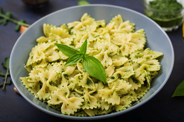 Vegan  Farfalle pasta in a basil-spinach sauce with garlic