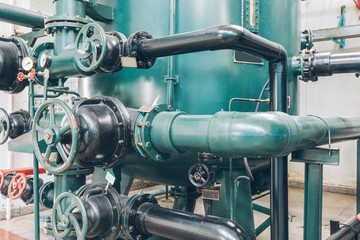 steel pipelines and cables in a plant,Industrial zone.