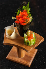 Fototapeta na wymiar crab roe hand roll sushi