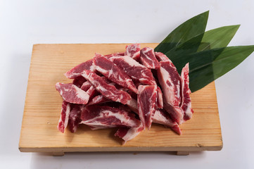 cut beef rib on wood