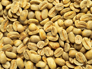 top view of green coffee beans background