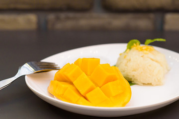 Thai style tropical dessert, Sweet Sticky rice with mangoes