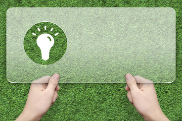 Bulb symbol message box with green grass background