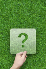 Question mark message box with green grass background