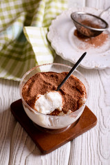 Tiramisu, traditional Italian dessert in glass