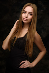 Beauty portrait of a young woman with long hair