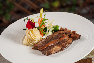 steak with vegetable salad