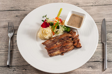 steak with vegetable salad