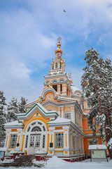 Fototapeta na wymiar ALMATY, REPUBLIC OF KAZAKHSTAN - NOVEMBER 20, 2016: Ascension Cathedral in Almaty, built in 1907
