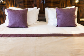 set of the laid bed and pillows on the bed