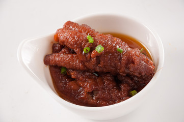 Braised chicken feet in brown sauce