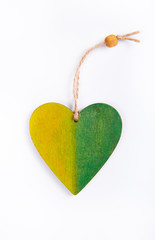 A wooden heart. Pendant from a tree in the form of heart.