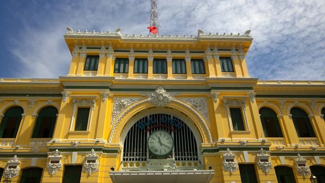 HO CHI MINH CITY, VIETNAM - JANUARY 18, 2016: Saigon Central Post Office designed by Gustave Eiffel. Local people and tourist take a sight seeing at Post Office