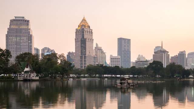 Cityscape, office buildings and apartments in Thailand at dusk
