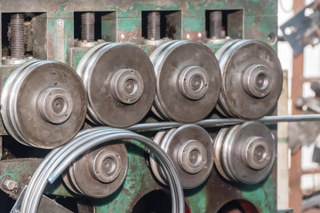 Plumber Using Pipe Bending Tool