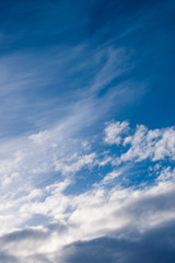 The backdrop of blue winter sky with dark clouds at sunrise in the early morning