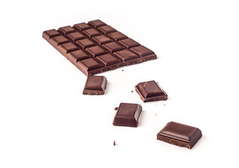 A piece of chocolate with chocolate bar isolated on white background