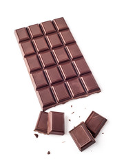 A piece of chocolate with chocolate bar isolated on white background