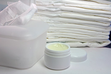 Adult diapers with wet wipes and cream