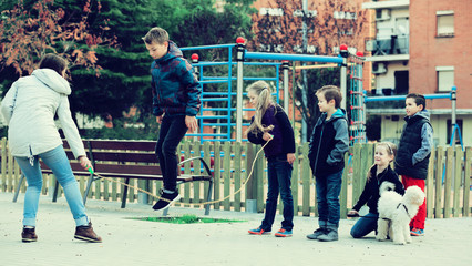 Children playing skipping rope