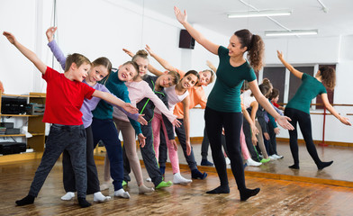 Children dancing contemp in studio smiling and having fun