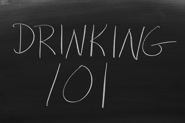 The words "Drinking 101" on a blackboard in chalk