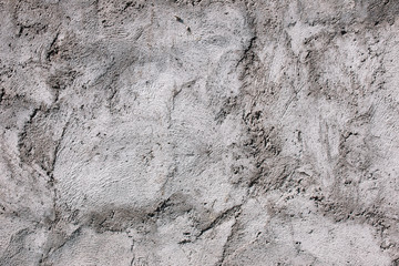 Texture of grey concrete wall, close up