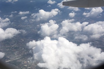 Naklejka na ściany i meble Sunset Cloud view from Airplane