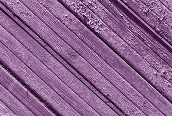 Weathered violet wood house wall