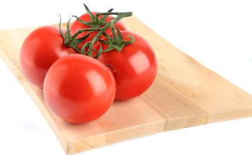 Tomatoes cherry branch isolated on white background