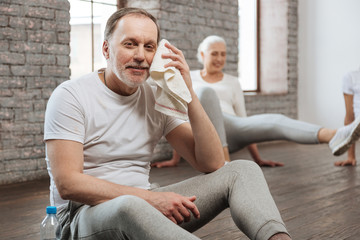 Fototapeta premium Delighted bearded male person having rest